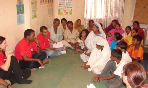 Photo 1- Listening to Micro Finance Groups and their Families